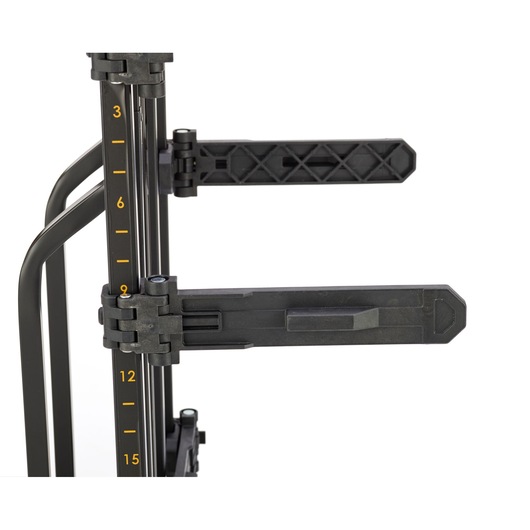Close-up of a DEWALT photography accessory with adjustable black arms and measurement markings on a vertical metal pole.