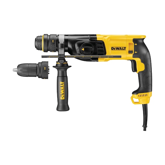 A yellow and black DEWALT corded rotary hammer drill with a side handle, depth gauge, and an interchangeable chuck attachment.