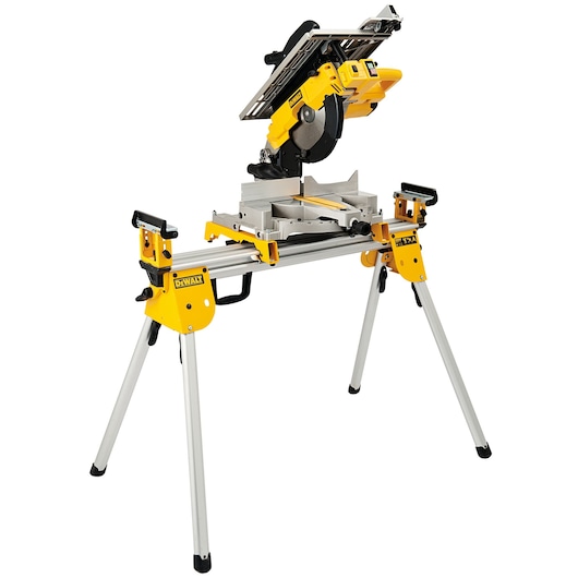 A yellow and silver DEWALT combination mitre saw and table saw mounted on a foldable stand, designed for woodworking and construction tasks.