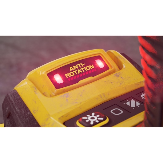 Close-up view of a yellow DEWALT power tool with an illuminated 'ANTI-ROTATION' warning indicator and various control buttons.