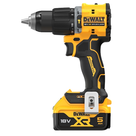 A DEWALT 18V XR Brushless cordless drill with a 5 Ah battery, shown upright on a white background. The drill has a black and yellow body and metallic chuck, featuring ergonomic grip and a belt clip attached to the base.