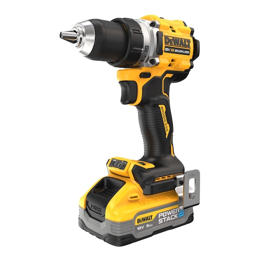 A DEWALT cordless power drill with an 18V XR brushless motor and POWERSTACK battery. The drill is yellow and black with a robust ergonomic handle and metal belt clip.