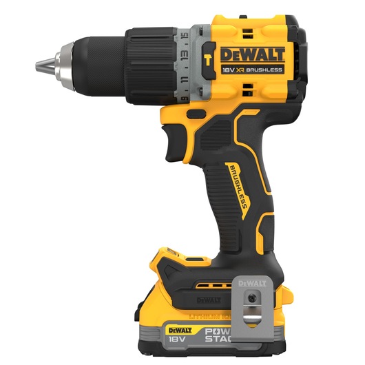 A DEWALT 18V XR brushless cordless drill with a yellow and black design, side view, showing the lithium-ion battery pack attached at the base.