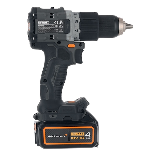 A DEWALT cordless power drill with a black and orange design, featuring an 18V XR lithium-ion battery. The branding includes McLaren and 'BRUSHLESS' on the handle.