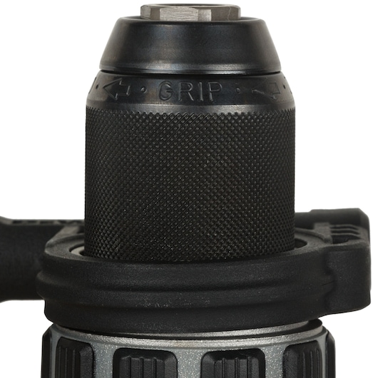 Close-up of the chuck on a DEWALT power drill, showing textured grip and directional arrows for tightening and loosening.