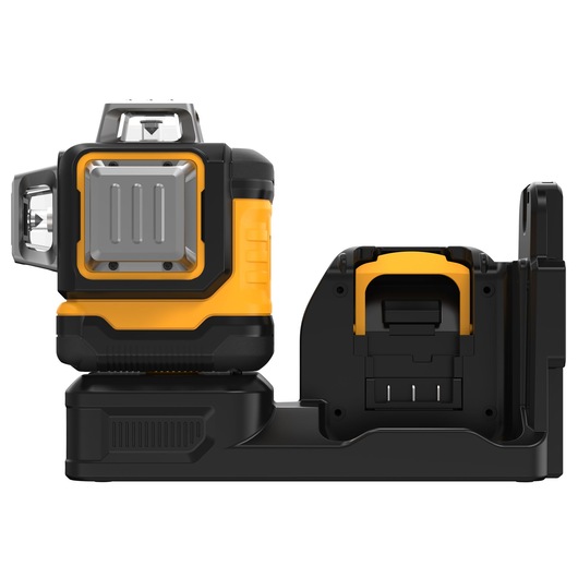 A DEWALT DCE089D1G18 self-leveling green cross line laser level, shown on its charging dock. The tool is black and yellow with a compact design.
