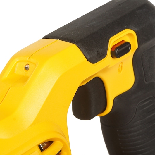 Close-up image of a DEWALT DCE531N-XJ tool handle showing the yellow and black grip, switch, and part of the body.
