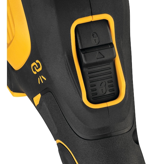 Close-up of a DEWALT tool showing a black and yellow locking switch with lock and unlock symbols, and a chain link icon with lines indicating connectivity.