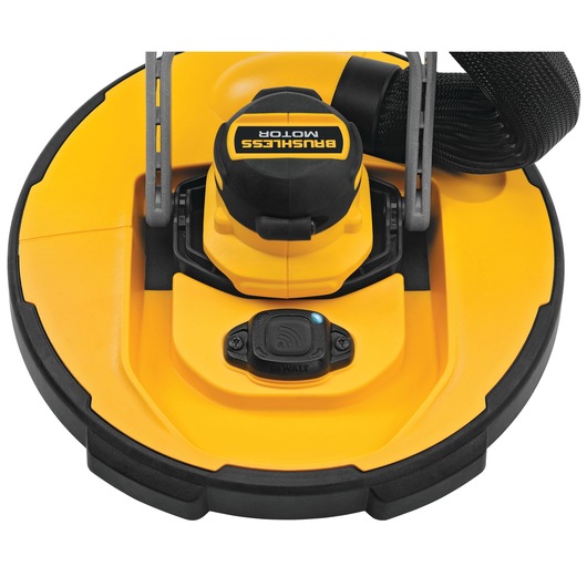 Close-up view of a DEWALT cordless drywall sander head with a brushless motor. The tool is yellow with black accents and a connectivity module is visible on the front.