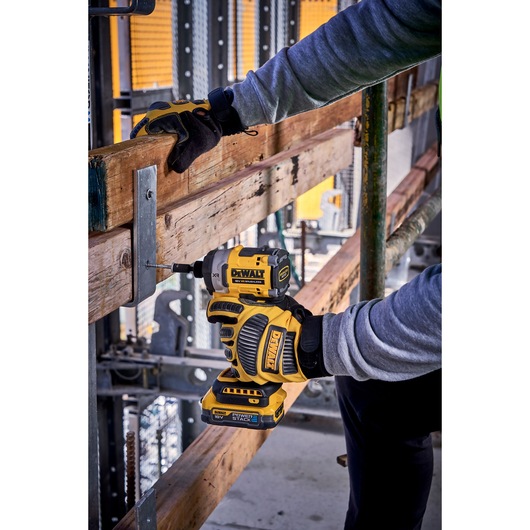 DEWALT tool DCF860N-XJ, DCF860N used on wood, construction site. Photography category.