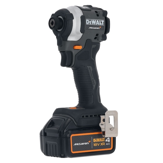 A DEWALT McLaren 18V XR cordless brushless impact driver with a black and orange battery attached, shown standing upright.