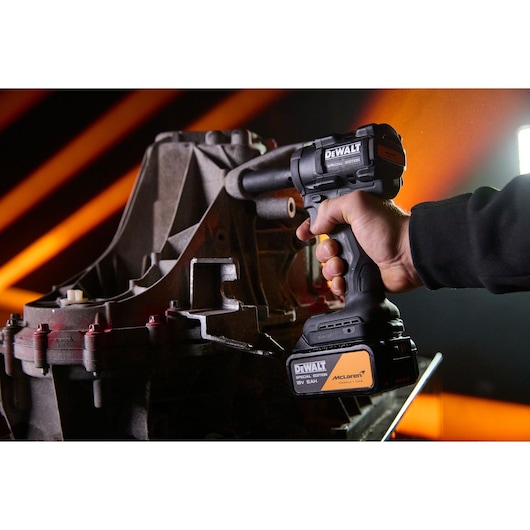 DEWALT x McLaren F1 Team 18V XR Special Edition Impact Wrench with 5Ah battery in application