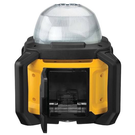 A DEWALT portable work light with a dome-shaped translucent cover, rugged black and yellow casing, and an open battery compartment located at the front.