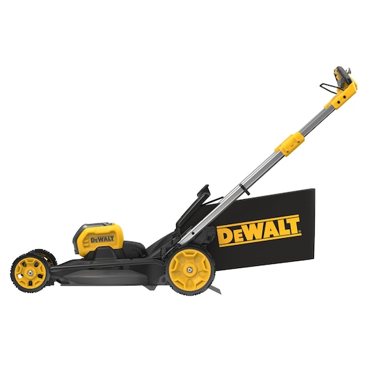 Side view of a DEWALT cordless electric lawn mower with yellow wheels and a black grass collection bag featuring the DEWALT logo.