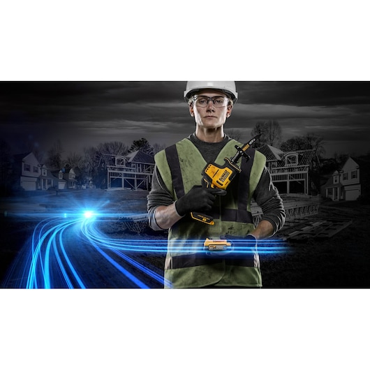 A person wearing a safety vest and hard hat holds a DEWALT DCS369E1T power tool with digital effects and blue light trails in the foreground. The background shows houses and a construction site.