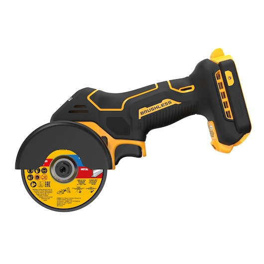 Cordless DEWALT brushless compact cut-off tool with yellow and black design, protective guard, and safety instructions on the cutting disc.