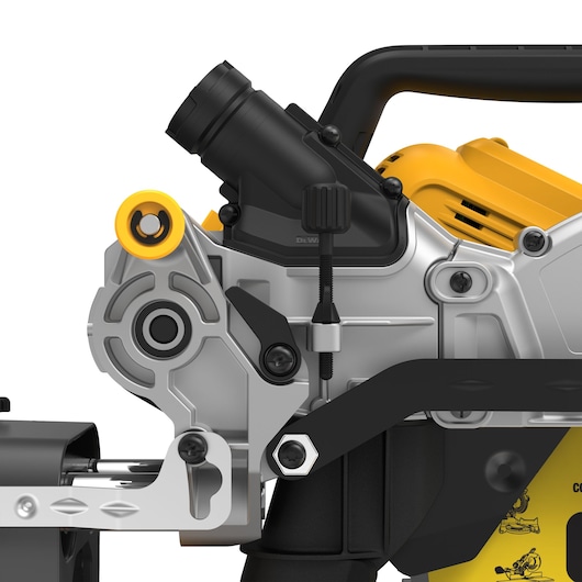 Close-up view of a DEWALT DCS781N power tool, showcasing part of the motor housing, handle, and adjustment mechanisms. The tool features yellow, black, and silver components.