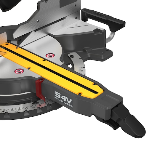 Close-up of a DEWALT 54V brushless miter saw, showing the cutting area, handle, and measurement scale.