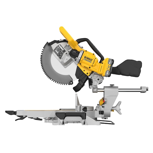 A DEWALT DCS782XW2 cordless sliding compound miter saw, featuring a yellow and black design, is shown in profile with its blade guard, dust bag, and adjustable base.