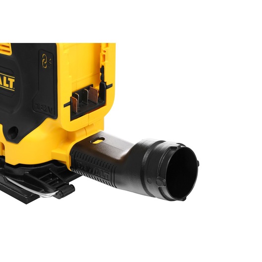 Close-up view of a DEWALT DCW200N power tool showing the battery compartment and a black dust extraction attachment.