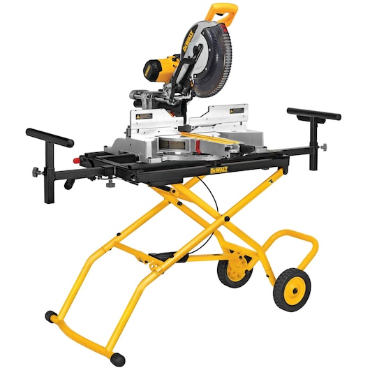 A DEWALT miter saw mounted on a yellow folding stand with wheels and adjustable side supports, designed for woodworking and construction tasks.