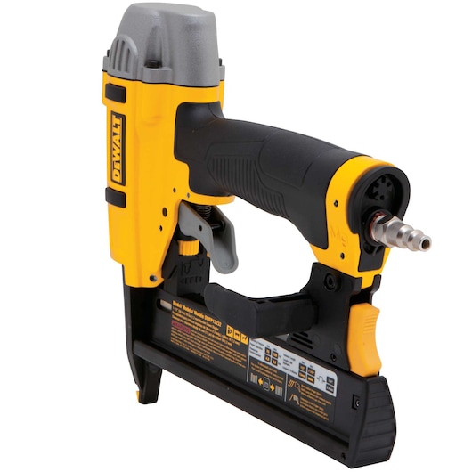 A DEWALT DPN1850 pneumatic nail gun with a yellow and black body, ergonomic grip, and metal nozzle, shown isolated on a white background.