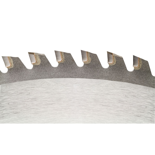 Close-up of a DEWALT circular saw blade showing several sharp teeth and the metallic surface, used for cutting materials.