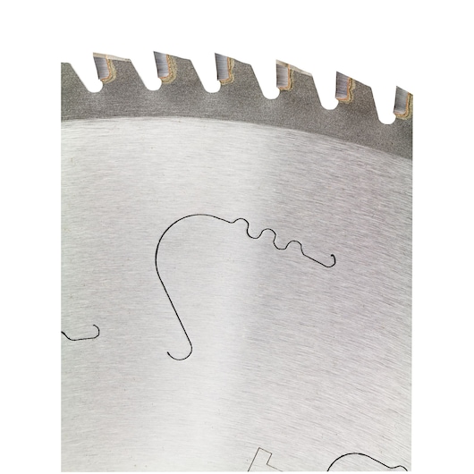 Close-up view of the cutting edge of a circular saw blade, showing metal teeth and detailed grooves on the surface.