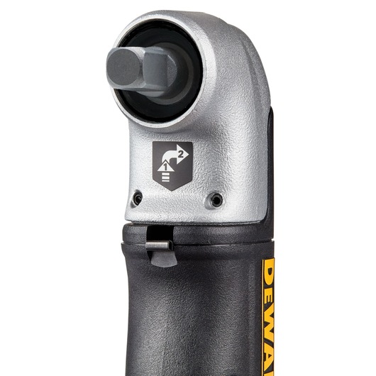 Close-up of a DEWALT right angle drill attachment, showing the metallic head and black handle, with an arrow direction indicator on the head.