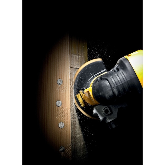 DEWALT DT20711, DT20711-QZ tool cutting wood in action, close-up view, photography category.