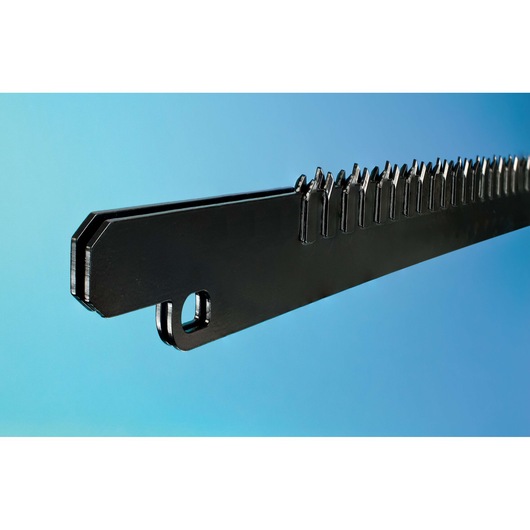 Close-up of a DEWALT metal saw blade with sharp teeth against a blue background.