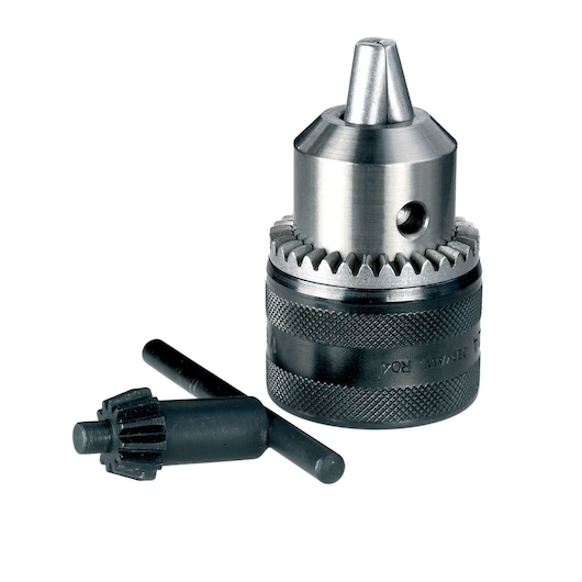 A metal drill chuck with an accompanying chuck key, both placed on a white background. The chuck is used for holding drill bits in power drills.