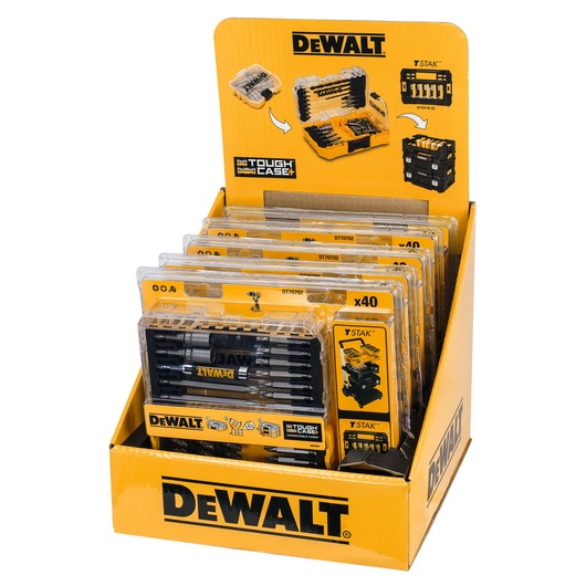 Display box showing several DEWALT DT70702 Tough Case+ sets containing drill and screwdriver bits, all packed in transparent plastic cases with yellow branding.