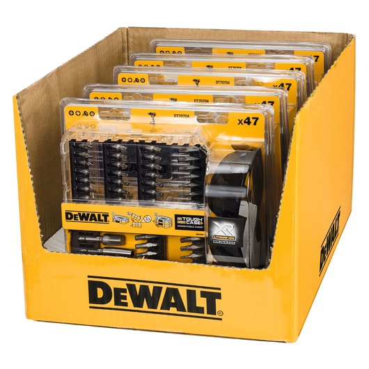 A cardboard display box containing several DEWALT DT70704 sets of screwdriver and drill bits, packaged in plastic cases. The DEWALT logo and branding are prominently visible on the box and packaging.