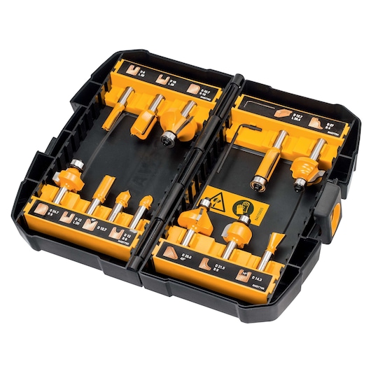 A DEWALT branded router bit set in an open black and yellow plastic storage case. The set contains various router bits neatly organized and labeled by size and type.