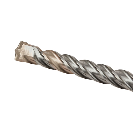 Close-up view of a DEWALT DT9684 spiral drill bit with a sharp, chisel-shaped tip designed for concrete and masonry drilling.