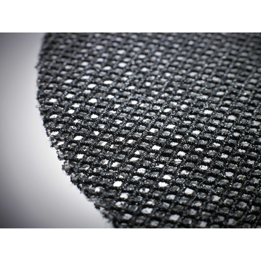 Close-up view of a DEWALT mesh sanding disc showing its woven texture and evenly spaced holes.