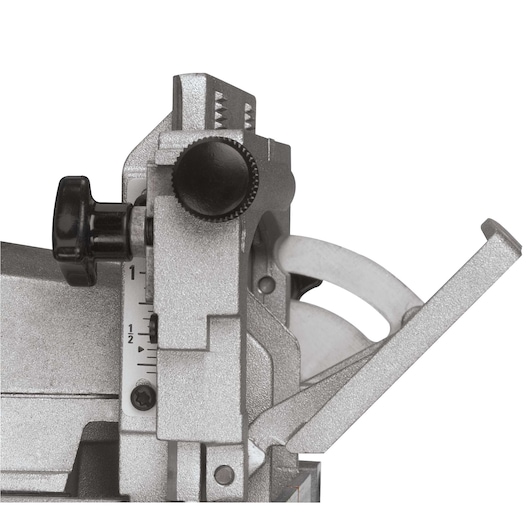 Close-up view of a DEWALT DW682K-QS woodworking power tool, showing adjustment knobs and part of the blade mechanism.