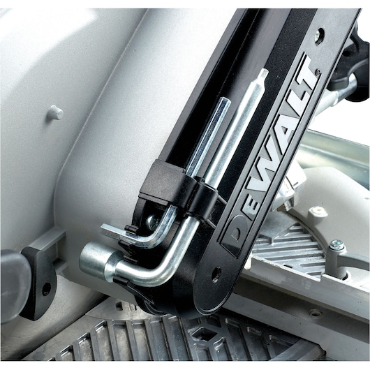 Close-up image of a DEWALT branded metal mechanism and part of a machine, showing detailed construction features and assembly.