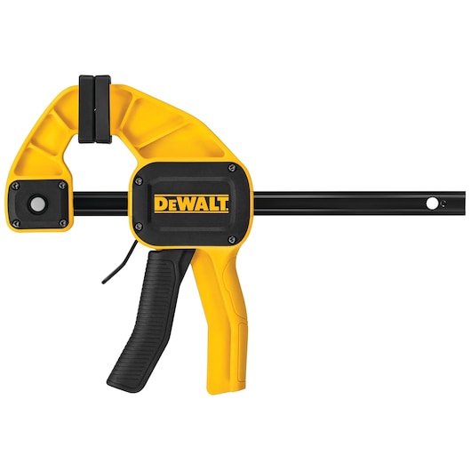 A DEWALT yellow and black trigger clamp, used for securing materials during woodworking or other tasks.