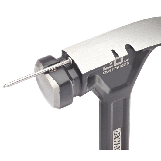 Close-up image of a DEWALT hammer head, model DWHT51009, with a nail resting on its magnetic holder. The hammer has a polished steel head and visible engraved markings indicating 20 ounces.
