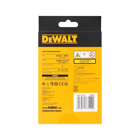 Back view of a DEWALT laser distance measurer packaging, displaying product specifications including range, accuracy, measurement units, included accessories, safety warnings, certifications, barcode, and contact information on a yellow and black background.