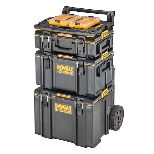 A rolling DEWALT ToughSystem 2.0 tool storage system with three stacked black and yellow boxes, featuring latches and handles, mounted on two large wheels with a telescopic handle, and a smaller organizer box on top.