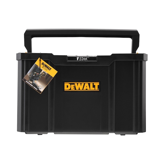 Front view of a DEWALT TSTAK black storage box with a large carrying handle and an attached product information tag.