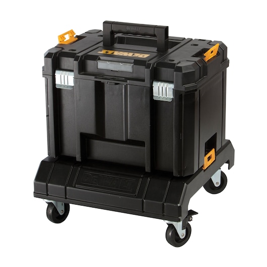 A black DEWALT rolling storage box with yellow latches and a sturdy handle, designed for tool organization and mobility, shown on four caster wheels.