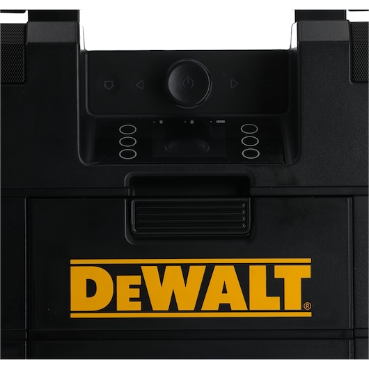Close-up of a DEWALT black toolbox with yellow logo and control buttons at the top front.