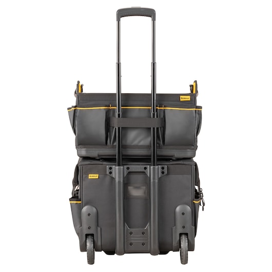 Front view of a DEWALT rolling tool bag with a telescopic handle, two wheels, and multiple compartments in black with yellow accents.