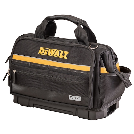 A black DEWALT branded tool bag with yellow detailing and multiple compartments, featuring carry handles and a sturdy base. The bag has a zippered front pocket and is labeled 'TSTAK'.