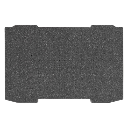 Rectangular black foam insert with notched corners, designed for protective storage or organization purposes.