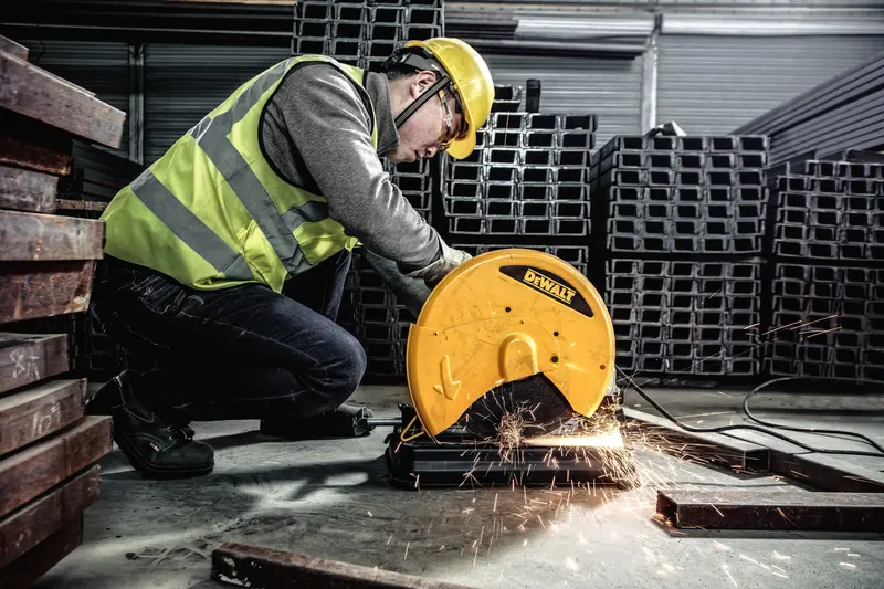 DEWALT saw in use, cutting metal, SKUs D28730-B2, D28730-BR, D28730-B3, D28730, D28730-AR, sparks flying.